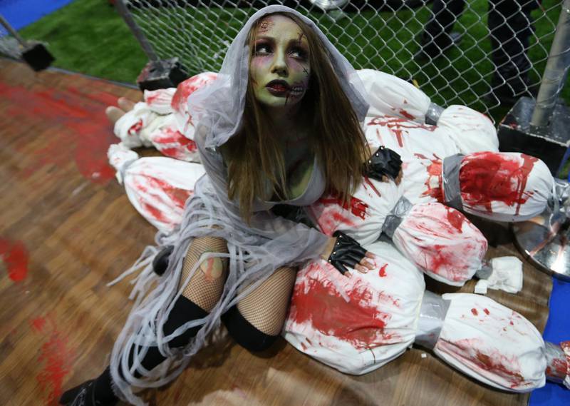 epa07500141 A guest dressed as a zombie attends Middle East Film and Comic Con. EPA