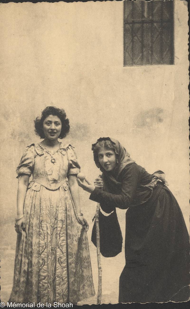 Jeannette Wolgust (L) and Francoise Brun, both hidden by the Marcel Network, prepare for a performance of Snow White at the Jeanne D'Arc convent in Grasse, France. Memorial de la Shoah/Coll.Jeannette Wolgust