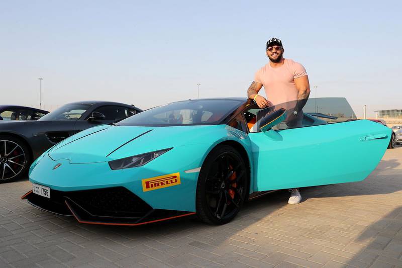 DUBAI, UNITED ARAB EMIRATES, August 31 – 2018 :- Damon Silver with his Lamborghini car at the Dubai Autodrome in Dubai. Members and Guests of the Ninth Degree supercars club driving their cars during the Ninth Degree supercars club meet held at Dubai Autodrome in Dubai. ( Pawan Singh / The National )  For Motoring. Story by Adam Workman