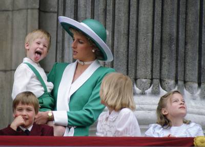 A young Prince Harry with this mother, Princess Diana, and brother Prince William looking out from the balcony of Buckingham Palace in London. Diana is perhaps a modern day example of what happens when family cultures don't evolve. Tim Graham Photo Library via Getty Images