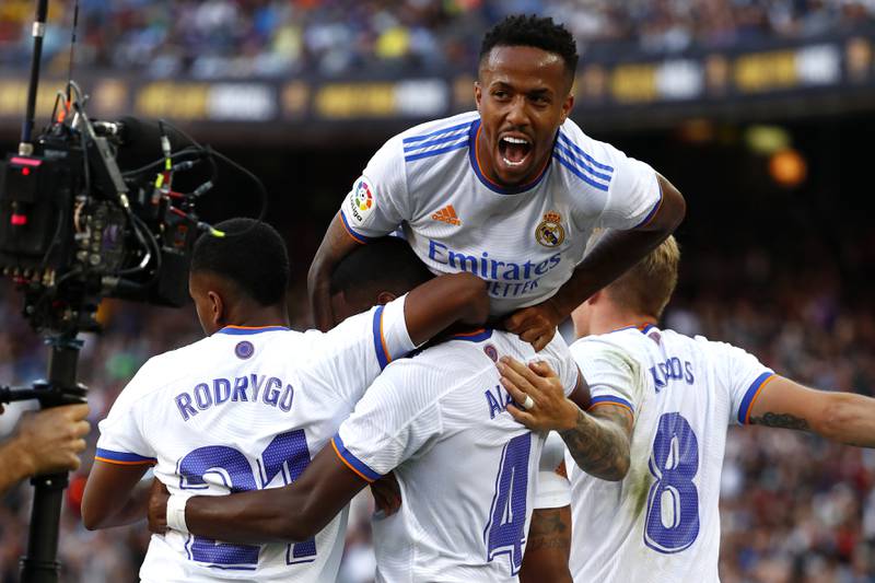 Real Madrid players celebrate with David Alaba after he scored the opening goal. EPA