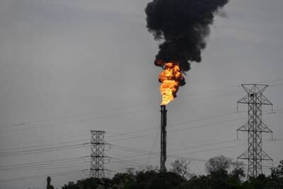 Gas being flared at an oil complex in Anzoategui State, Venezuela. AP