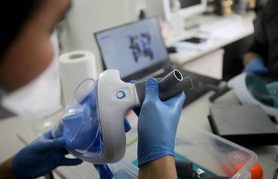 Volunteer dentists assemble snorkel masks and convert them into respirators, using 3-D printing technology, to reinforce hospitals and help patients suffering from the coronavirus in Algiers, Algeria April 15, 2020. Reuters