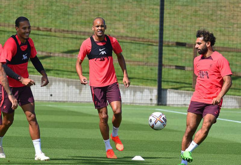 KIRKBY, ENGLAND - AUGUST 20:(THE SUN OUT. THE SUN ON SUNDAY OUT) Virgil van Dijk, Fabinho and Mohamed Salah of Liverpool during a training session at AXA Training Centre on August 20, 2022 in Kirkby, England. (Photo by John Powell / Liverpool FC via Getty Images)
