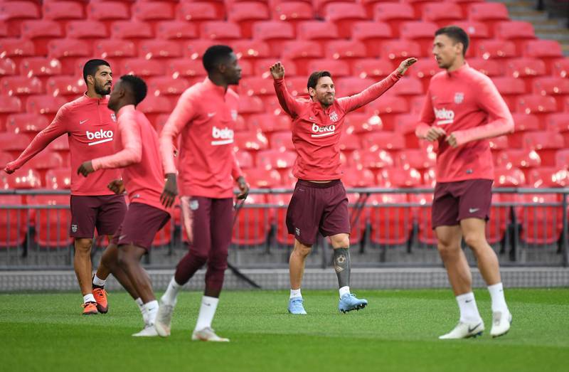 Lionel Messi and his Barcelona teammates during a training session at Wembley Stadium. EPA