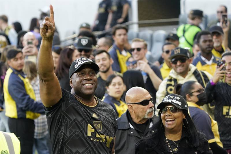 Los Angeles FC chairman and CEO Magic Johnson, left, celebrates after defeating the Philadelphia Union. AP