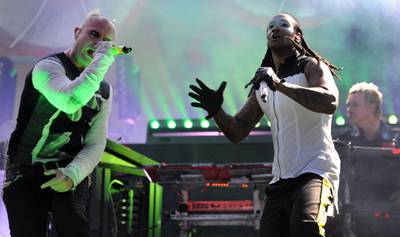Keith Flint (L), Maxim (C) and Liam Howlett (R) perform on July 18, 2015 in Carhaix-Plouguer, France, during the Vieilles Charrues music festival. Photo: AFP