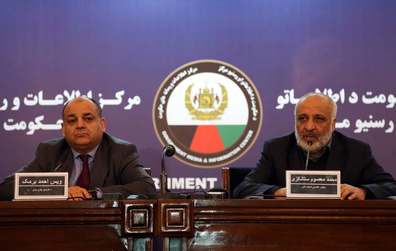 Masoom Stanekzai Afghanistan's intelligence chief, right, and Wais Ahmad Barmak, interior minister speaks during a joint press conference in Kabul, Afghanistan, Thursday, Feb. 1, 2018. At the news conference Wais Ahmed Barmak said they has given neighboring Pakistan confessions and other proof that the militants who carried out a recent series of attacks were trained in Pakistan and that Taliban leaders there are allowed to roam freely. (AP Photo/Rahmat Gul)