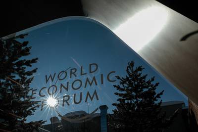 A logo sits on a window at the entrance hall of the Congress Center ahead of the World Economic Forum (WEF) in Davos, Switzerland, on Monday, Jan. 20, 2020. World leaders, influential executives, bankers and policy makers attend the 50th annual meeting of the World Economic Forum in Davos from Jan. 21 - 24. Photographer: Jason Alden/Bloomberg