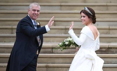 Britain's Princess Eugenie of York  arrives with her father, Prince Andrew, Duke of York for her wedding ceremony. EPA