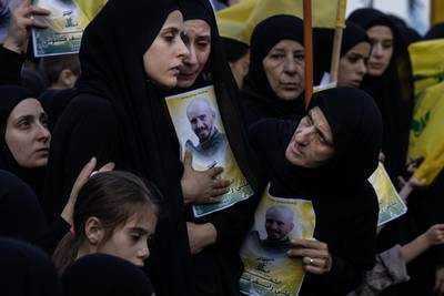 Women at a funeral for two Hezbollah soldiers killed in south Lebanon. Getty Images