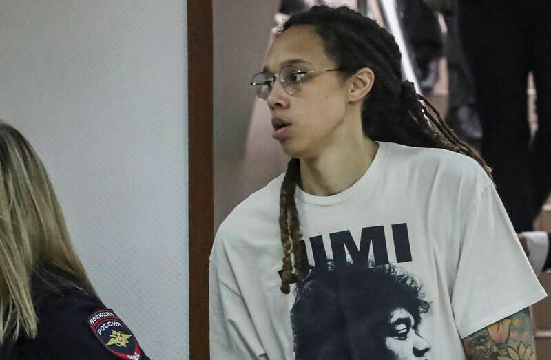 Two-time Olympic gold medallist and WNBA player Brittney Griner is escorted to a courtroom for a hearing in Khimki City Court, outside Moscow. EPA.
