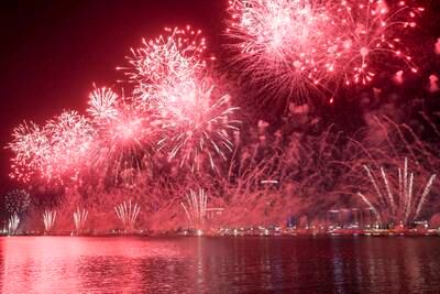 Grand fireworks lit up the night sky along the Abu Dhabi Corniche for UAE at 50 celebrations on December 2, 2021. Khushnum Bhandari / The National