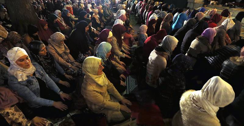 Bosnian Muslim women pray at the Gazi Husrev Bay's Mosque in Sarajevo, Bosnia and Herzegovina.  EPA