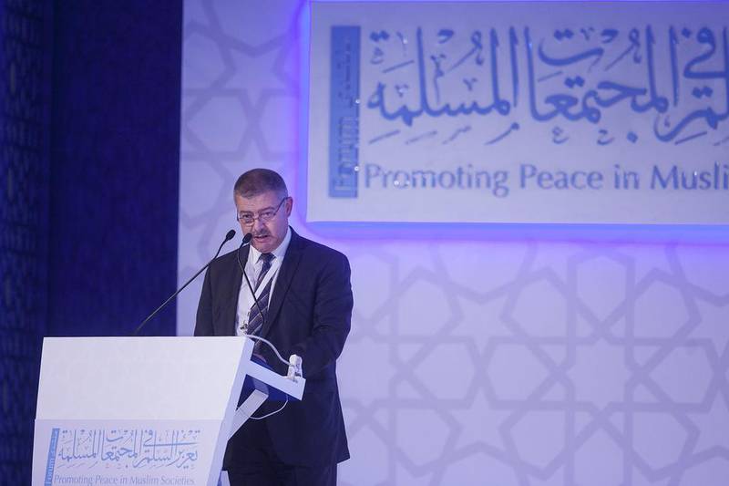 Dr. Mounir Tlili, former minister of Religious Affairs of Tunisia, addresses the Promoting Peace in Muslim Societies forum in Abu Dhabi. Mona Al Marzooqi/ The National 