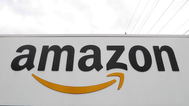 Amazon said it will offer its staff a mix of working between the office and home. AP