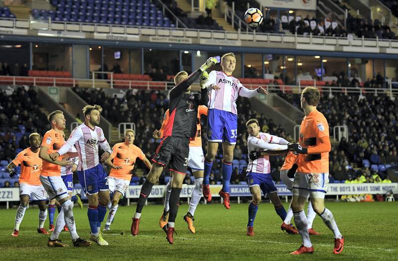 READING, ENGLAND - JANUARY 16:  Ben Wilmot of Stevenage jumps with Anssi Jaakkola of Reading during The Emirates FA Cup Third Round Replay match between Reading and Stevenage at Madejski Stadium on January 16, 2018 in Reading, England.  (Photo by Mike Hewitt/Getty Images)