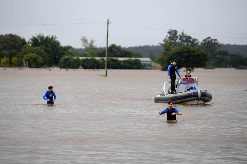 NSW Police Rescue are seen patrolling in floodwater at Windsor, north west of Sydney. Reuters