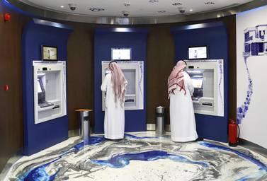 ATM machines at Al Rajhi Bank in Riyadh. The lender reported a 7 per cent drop in first-quarter net profit on higher operating expenses and impairment charge. Bloomberg