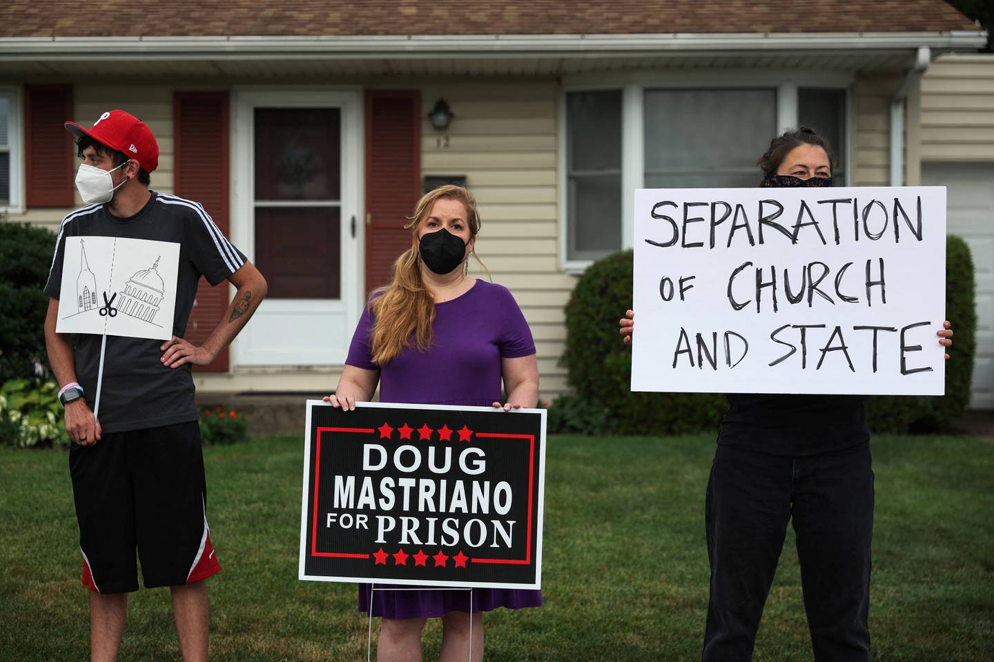 People demonstrate against Doug Mastriano, Republican gubernatorial candidate from Pennsylvania. Reuters