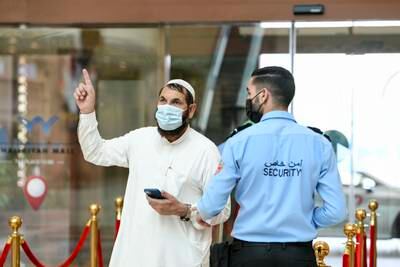 Face masks worn at Khalidiyah Mall on September 27, 2022, one day before the UAE lifted their mandatory use. Khushnum Bhandari / The National