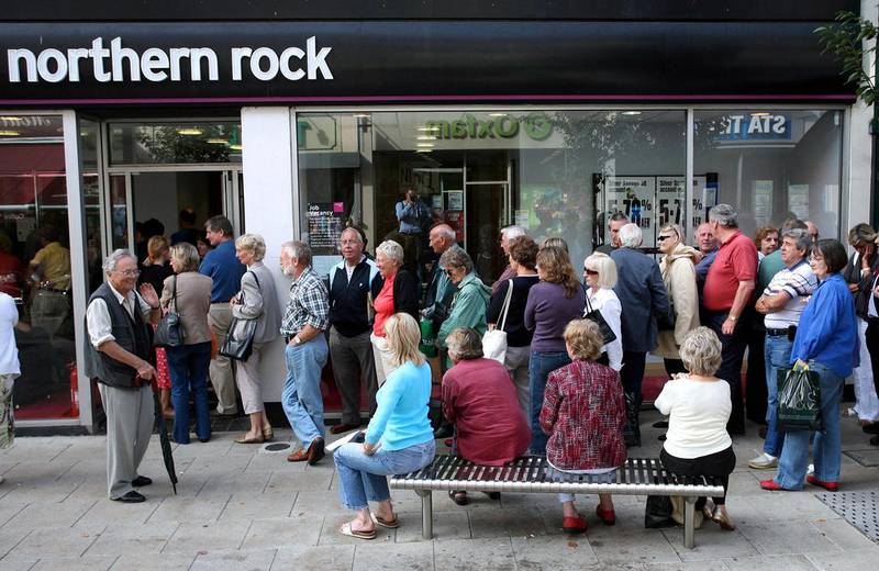 Northern Rock customers queue outside the branch in Surrey in 2007. Chris Ratcliffe / Bloomberg News