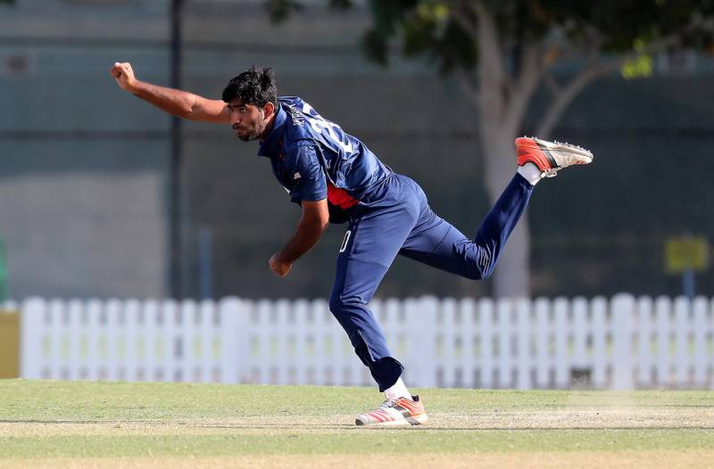 DUBAI, UNITED ARAB EMIRATES , Dec 12– 2019 :- :- Saurabh Netravalkar of USA bowling during the World Cup League 2 cricket match between UAE vs USA held at ICC academy in Dubai. USA won the match by 98 runs. He took 3 wickets in this match. ( Pawan Singh / The National )  For Sports. Story by Paul
