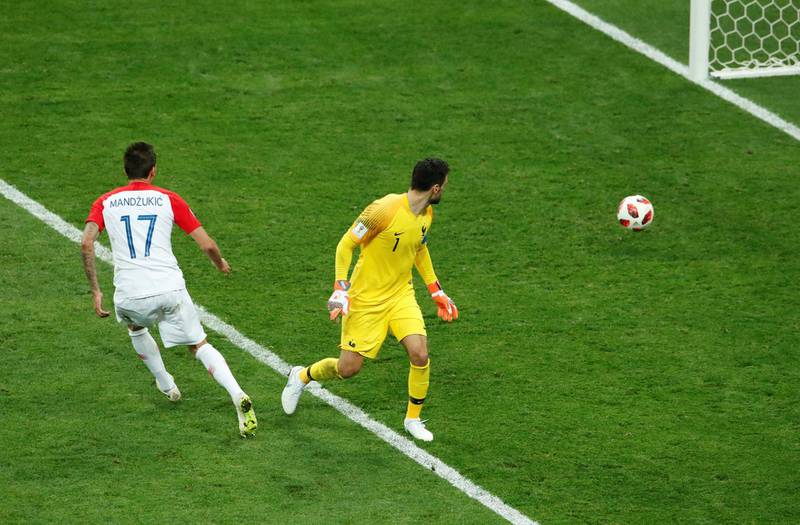 Croatia's Mario Mandzukic embarrasses France's Hugo Lloris to make it 4-2. Reuters