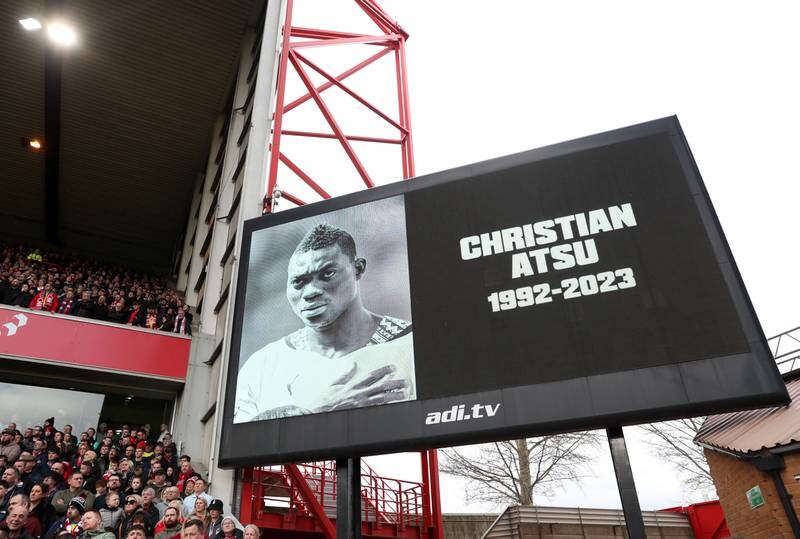 An image of former Premier League player Christian Atsu, who was recovered from the rubble of his home in Hatay following the Turkey earthquake, is shown on the screen as a minute's silence is observed in his memory prior to the Premier League match against Manchester City at City Ground on February 18, 2023 in Nottingham, England. Getty Images
