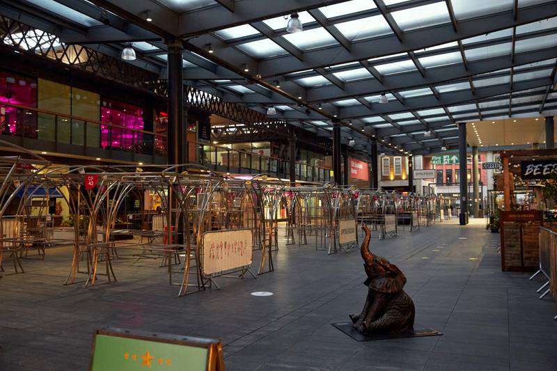 A statue of a baby elephant sits alone in a deserted Spitalfields Market. A spike in cases of coronavirus across the country has led to the third lockdown. Getty Images