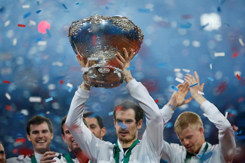 Murray celebrates with the trophy after winning the Davis Cup at Flanders Expo, Ghent, Belgium in 2015. Action Images via Reuters