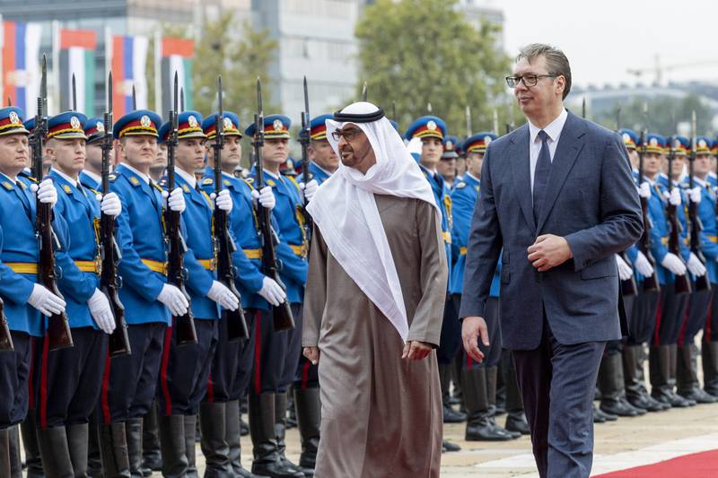 President Sheikh Mohamed bin Zayed, and Aleksandar Vucic, President of Serbia, inspect a guard of honour at a reception at the Palace of Serbia. Photo: Ryan Carter / UAE Presidential Court