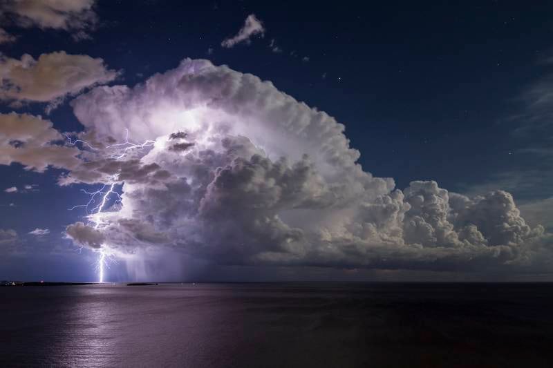Serge Zaka captured this thunderstorm as a full moon shone over the famous Bay of Cannes in the south of France.