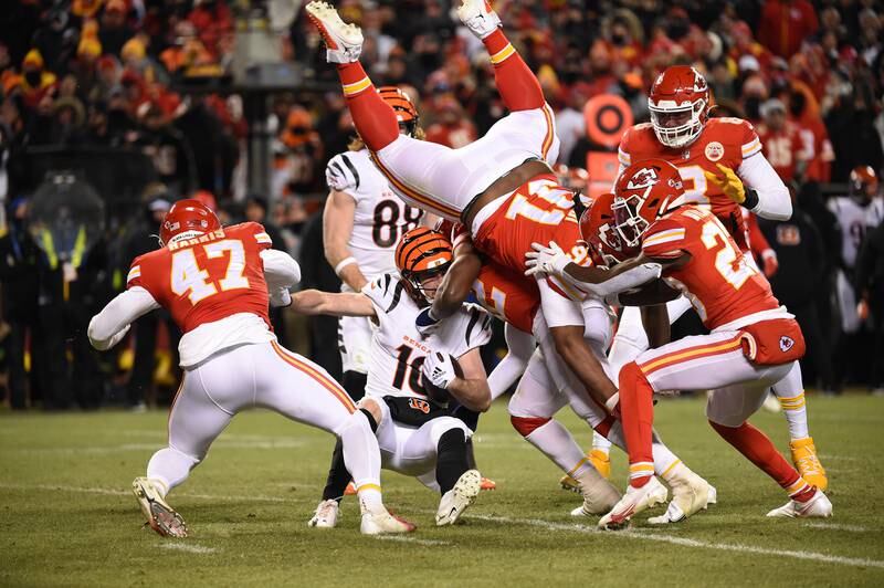 Cincinnati Bengals wide receiver Trenton Irwin is brought down by several Kansas City Chiefs players. EPA