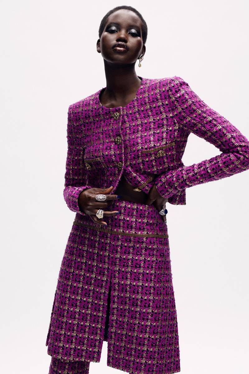 A woven tweed suit by Chanel. The wool fibres are deliberately irregular in thickness, giving a slightly bumpy surface texture. Autumn 2020 haute couture. Courtesy Chanel