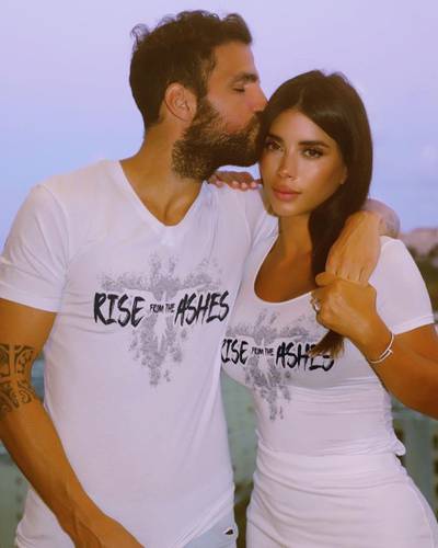 Spanish footballer Cesc Fabregas and Lebanese model Daniella Semaan Fabregas wearing Zuhair Murad's Rise from the Ashes T-shirt. Instagram / cescf4bregas