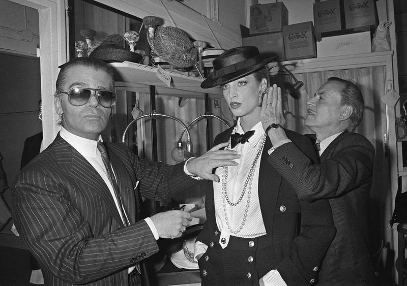 Lagerfeld continued on with Gabrielle Chanel's mix of mannish suiting and feminine jewellery, as seen here in 1983.  AFP