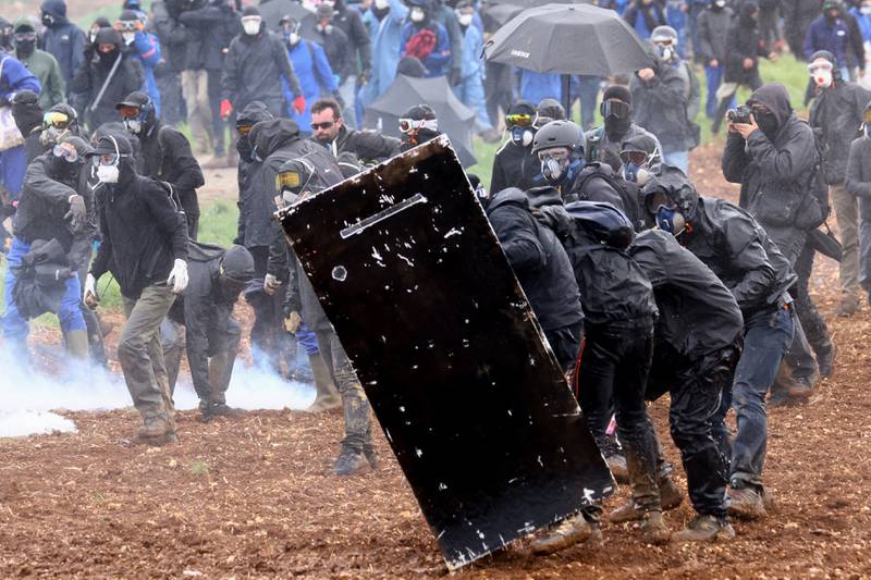 Anti-riot police clash with protesters in Sainte-Soline. Reuters 
