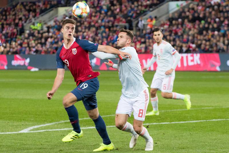 Norway's Markus Henriksen, left fights for the ball against Spain's Saúl Ñíguez right, during the UEFA Euro 2020 qualifying Group F soccer match between Norway and Spain at Ullevaal Stadium in Oslo, Norway. AP