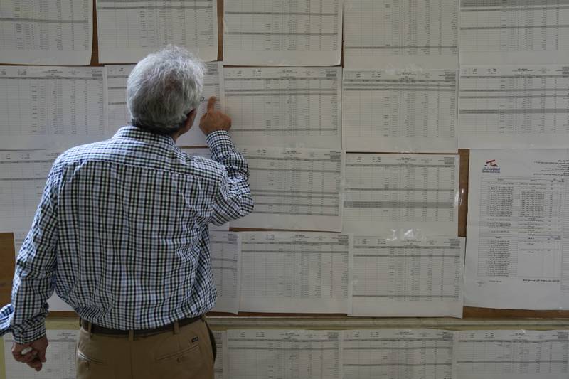 A man check voters' lists in the capital Beirut. AP