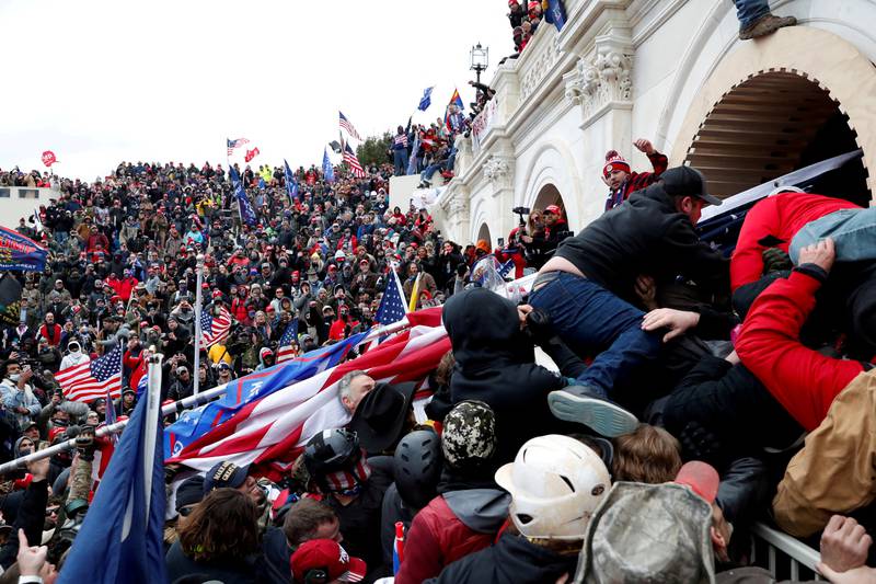 Pro-Trump protesters storm into the US Capitol. Reuters