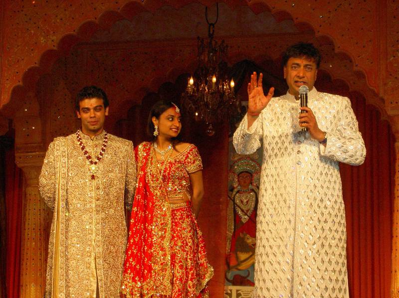 Steel tycoon Lakshmi Mittal, right, makes a speech during the dinner with his daughter Vanisha Mittal and husband Amit Bhatia at the Chateau Vaux le Vicomte. The six-day wedding party included a banquet for 1,000 guests at the Palace of Versailles, and the guest list included Bollywood stars and the cream of Indian high society. The wedding in 2004 set the template for extravagant celebrations and reportedly cost more than 2.4 billion rupees. Shutterstock