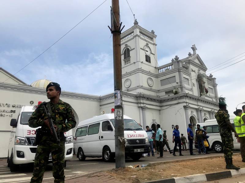 Sri Lankan military officials stand guard in front of the St. Anthony's Shrine, Kochchikade church after an explosion in Colombo, Sri Lanka.  Reuters