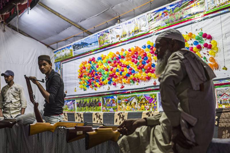 A vendor at a kiosk in New Delhi. Bloomberg