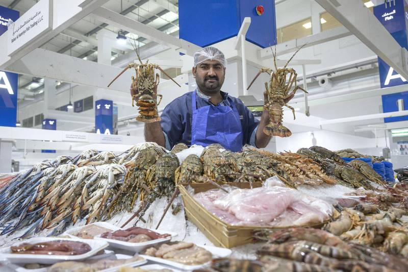 DUBAI, UNITED ARAB EMIRATES - Fedaa a vendor inside the seafood section at the Waterfront Market, Deira.  Leslie Pableo for The National