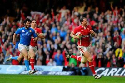 Jamie Roberts scores the first try for Wales against Italy in their victory in Cardiff.