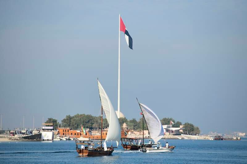 Dhow boats during the 51st National Day long weekend holidays at Abu Dhabi Corniche. Khushnum Bhandari / The National