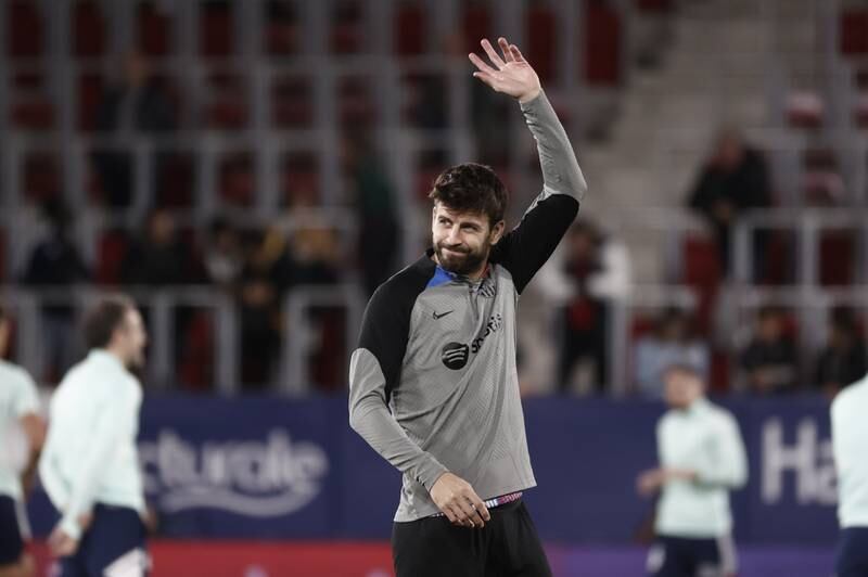 Barcelona defender Gerard Pique warms up ahead of the match against Osasuna. EPA 