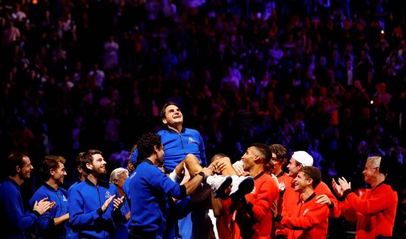 Team Europe and World members lift Roger Federer during the Laver Cup at the O2 Arena in London at the end of his last match before his retirement, on September 24, 2022. Reuters