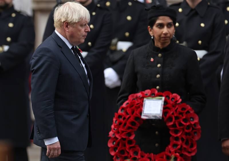 Former Prime Minister Boris Johnson and Suella Braverman attend the Remembrance Sunday ceremony in 2022. Getty